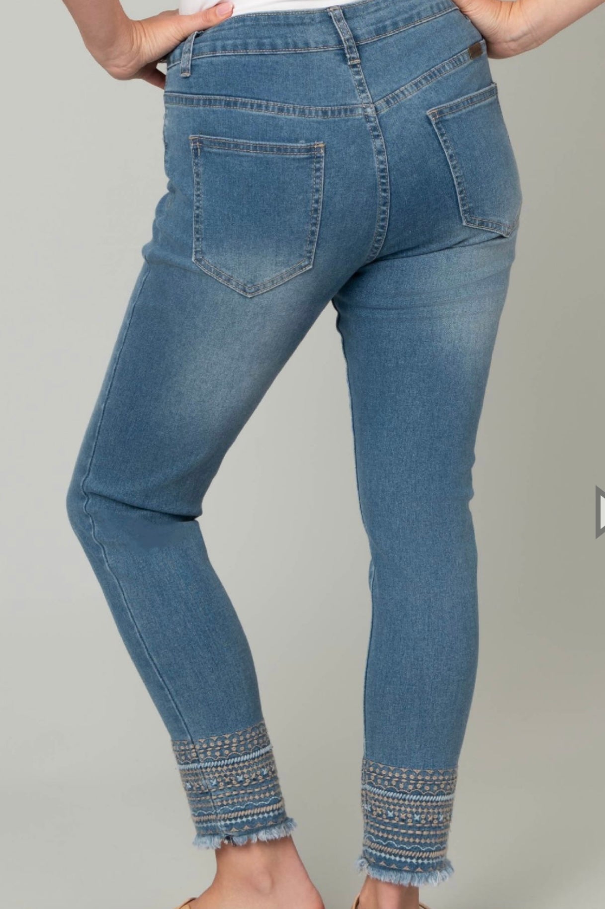 Embroidered Frayed Ankle Jeans