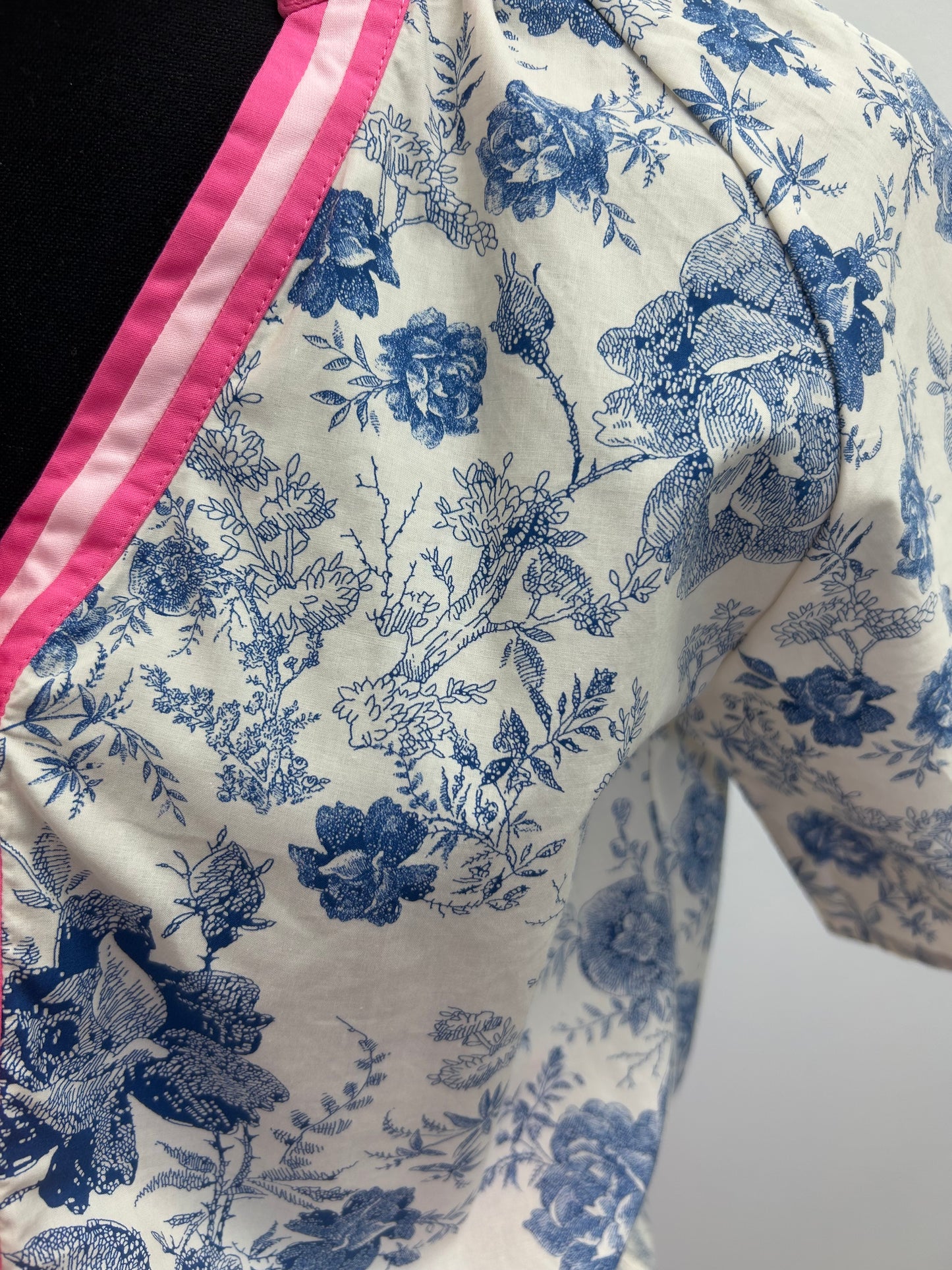 Blue and White Floral Top with Pink Collar